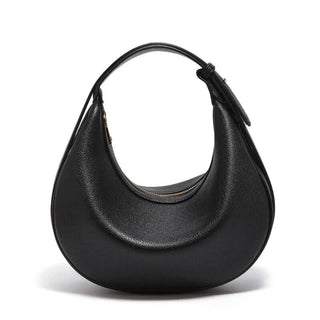 Half Moon Bag with Minimalist Design in black, featuring a sleek curved silhouette and zipper closure.