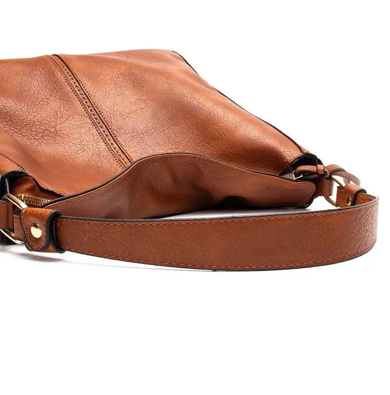 Hobo shoulder bag with a slouchy silhouette and crossbody strap, made from high-quality PU leather.