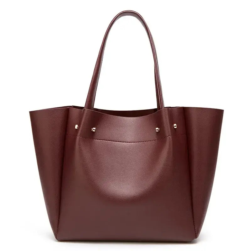 Shopper Bag with Slot Pocket and Zipper in burgundy color, featuring sturdy handles and elegant design.