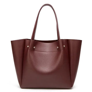 Shopper Bag with Slot Pocket and Zipper in burgundy color, featuring sturdy handles and elegant design.