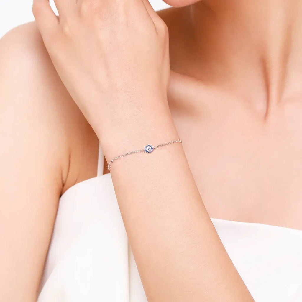 Bracelet 925 Sterling Silver worn on a woman's wrist featuring a zircon and crystal design.