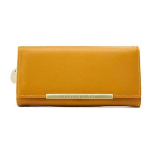 Stylish yellow leather wallet for women with zipper closure and gold decoration, perfect for everyday use.