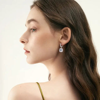 Moissanite Drop Earrings in 925 Silver worn by a model with elegant hairstyle.