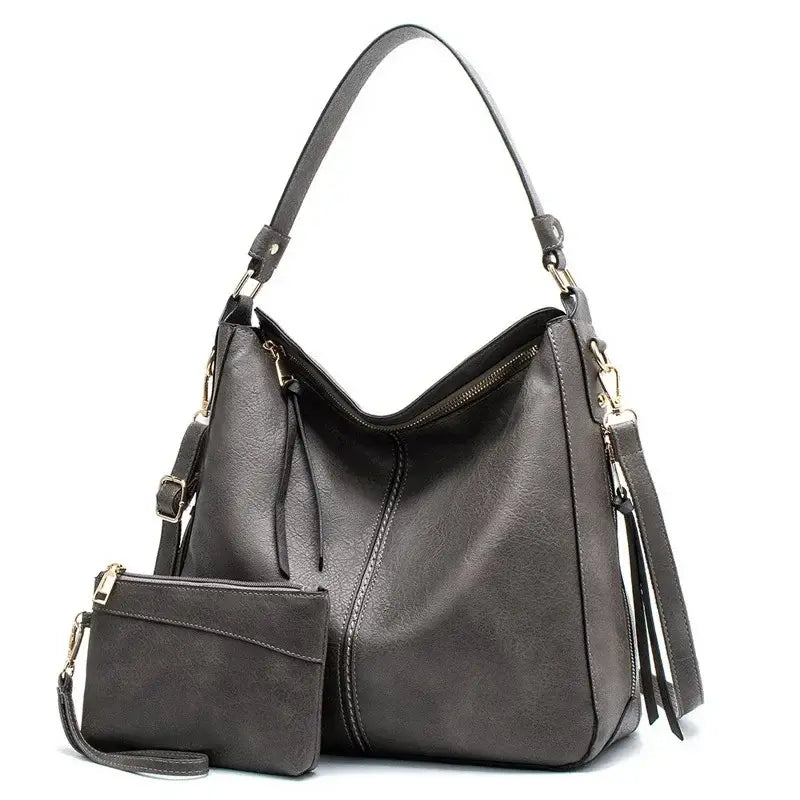 Hobo shoulder bag with matching wallet pouch in stylish gray PU leather.