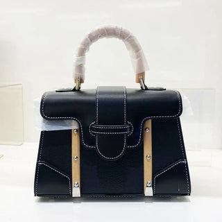 Handbag with wooden handle and rivet decoration, perfect for women's fashion.