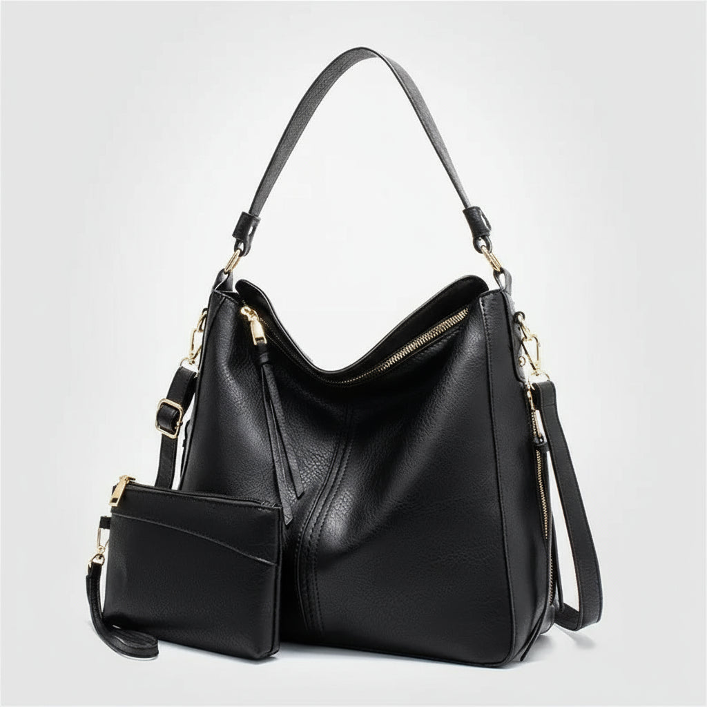 Hobo shoulder bag with matching wallet pouch in black PU leather, featuring gold-tone hardware and a slouchy silhouette.