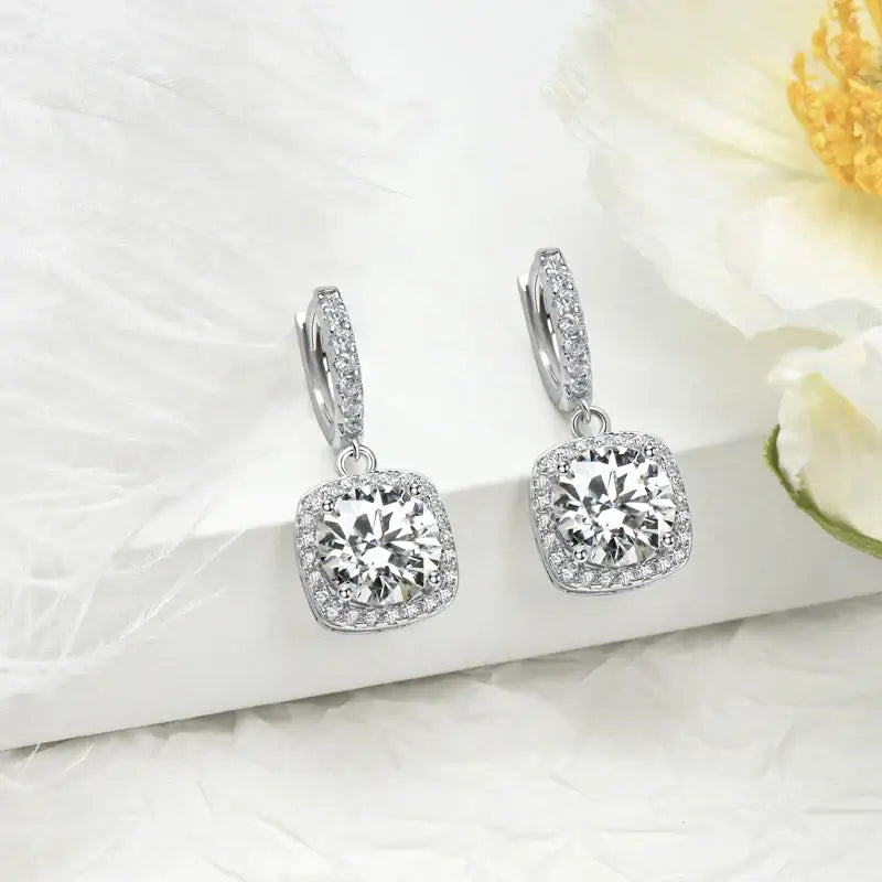 Moissanite Drop Earrings 925 Silver with sparkling cubic stones on a white background.