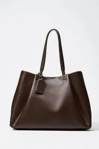 Tote Bag Classic with Zipper Pocket in solid brown color, featuring a spacious design and elegant handles.