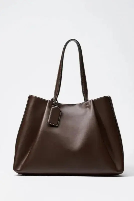 Tote Bag Classic with Zipper Pocket in solid brown color, featuring a spacious design and elegant handles.