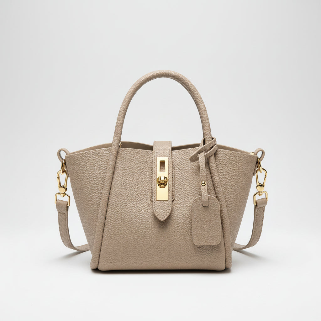 Stylish Women's Genuine Leather Bucket Bags in beige with gold accents and adjustable strap.