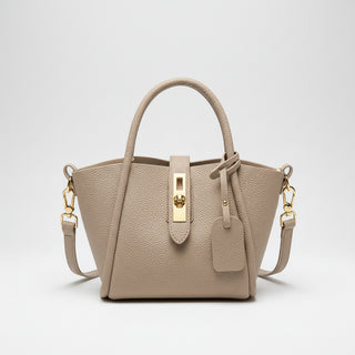 Stylish Women's Genuine Leather Bucket Bags in beige with gold accents and adjustable strap.