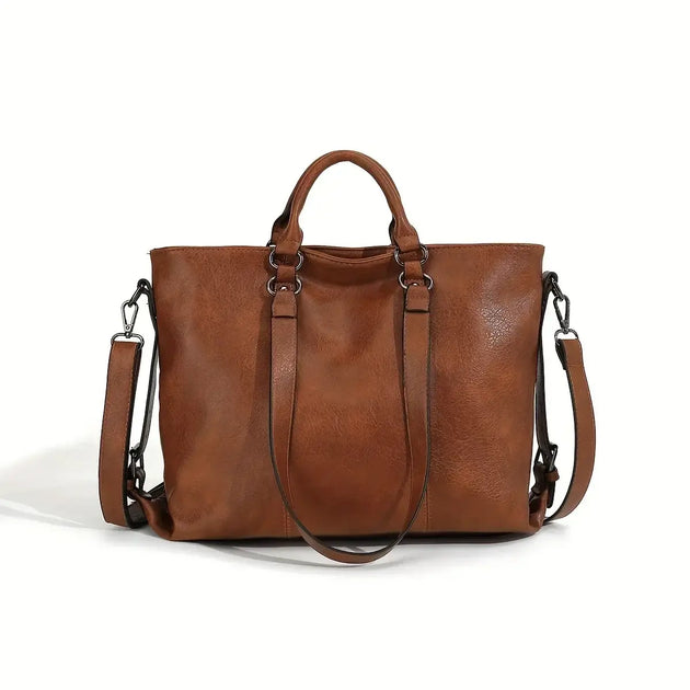 Vintage Women's Bag Large Capacity in brown leather with dual handles and adjustable strap.