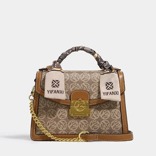 Women's Shoulder Crossbody Bag with floral pattern, ribbon details, and gold chain strap for fashionable styling.