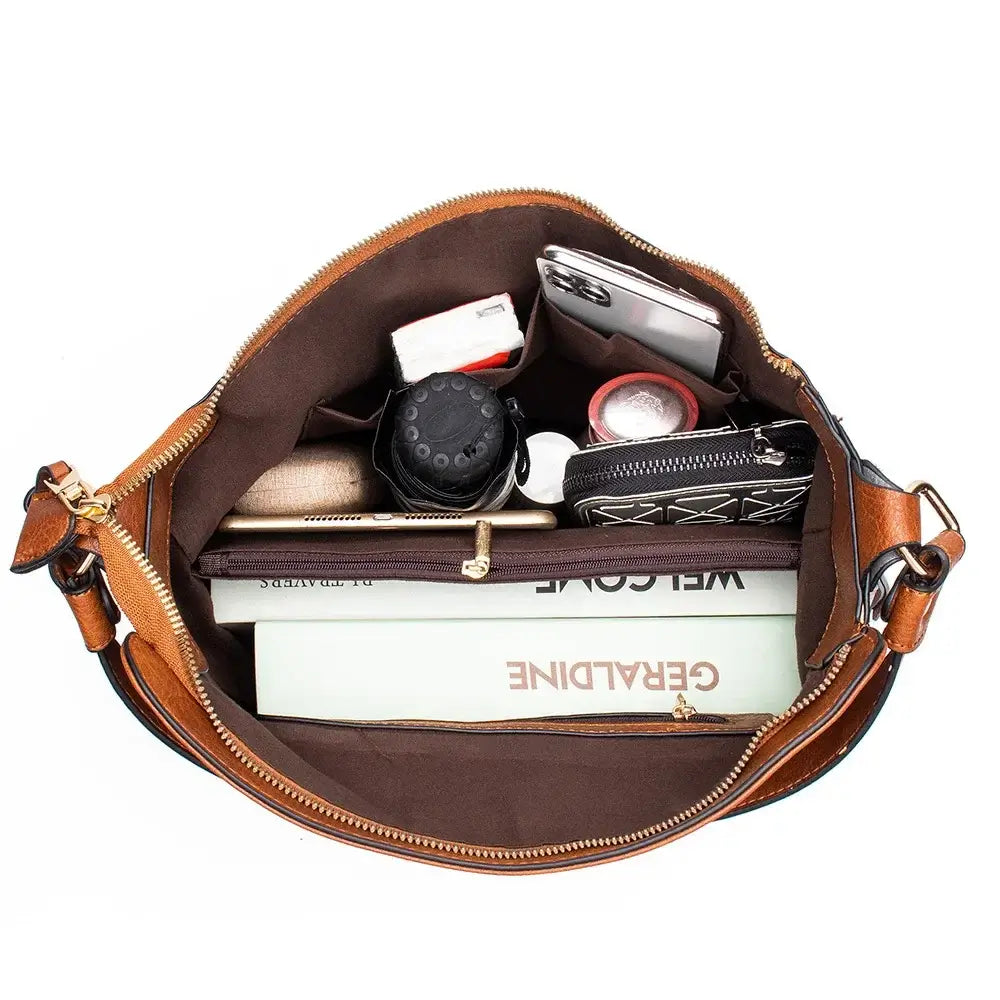 Hobo shoulder bag top view showing organized interior with wallet pouch and daily essentials.