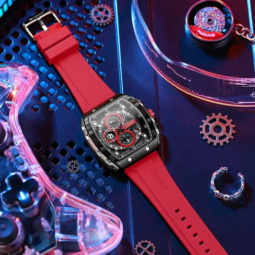 Sports Watches Unique Rectangular in red silicone on a stylish background with gaming accessories.