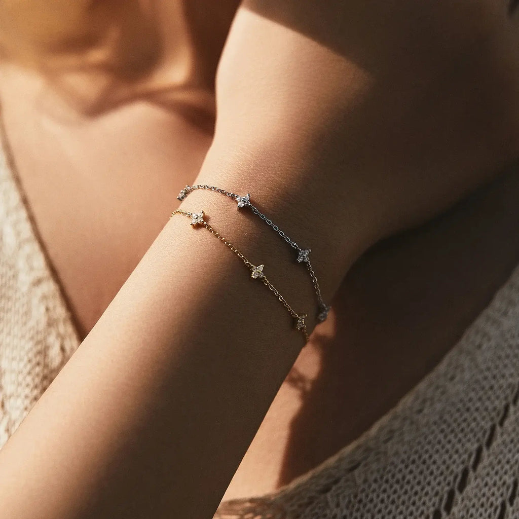 Elegant Bracelet 925 Sterling Silver with floral motifs and zircon accents worn on wrist, perfect for any occasion.