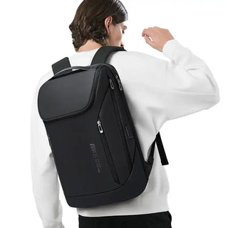 Bange Backpack USB Charging Waterproof shown on a model in a white sweater against a neutral background.