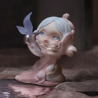 POP MART collectible figurine in soft pink and blue, featuring a delicate character with butterfly, perfect for display or gifting.