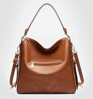 Hobo shoulder bag made from high-quality PU leather with a slouchy silhouette and gold-tone hardware.