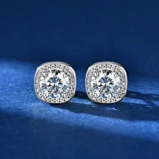 Moissanite Square Halo Earring featuring sparkling stones and intricate halo design on a blue background.