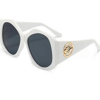 Sunglasses with a unique design and logo, white frame with gray lenses and stylish logo detail.
