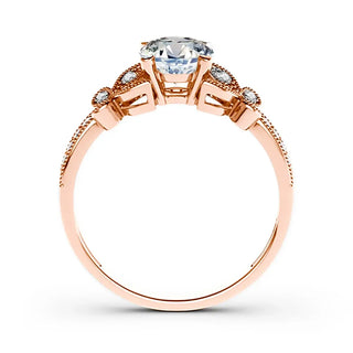 Moissanite Butterfly Rings For Women - Elegant rose gold ring featuring sparkling stones and a central moissanite gem.