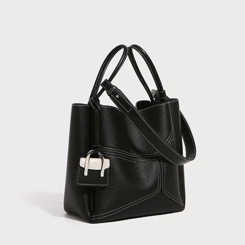 Genuine Leather Tote Bag with zipper pocket, stylish black design, perfect for everyday use.