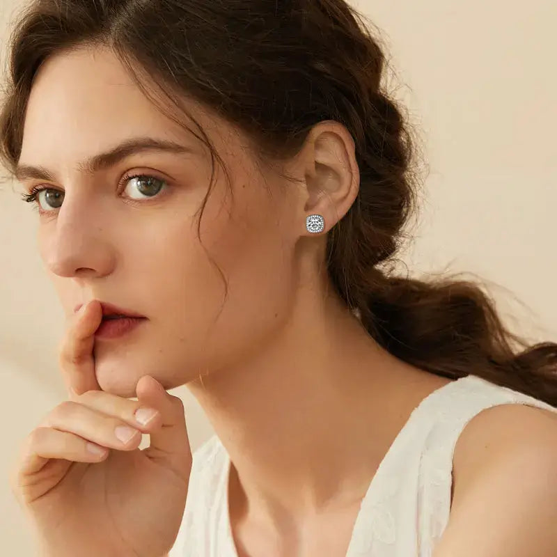 Moissanite Square Halo Earring worn by a woman with a soft expression, showcasing elegance and sparkle.