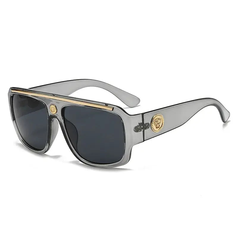 Sunglasses with gold detailing in gray frame, perfect for casual adult wear.