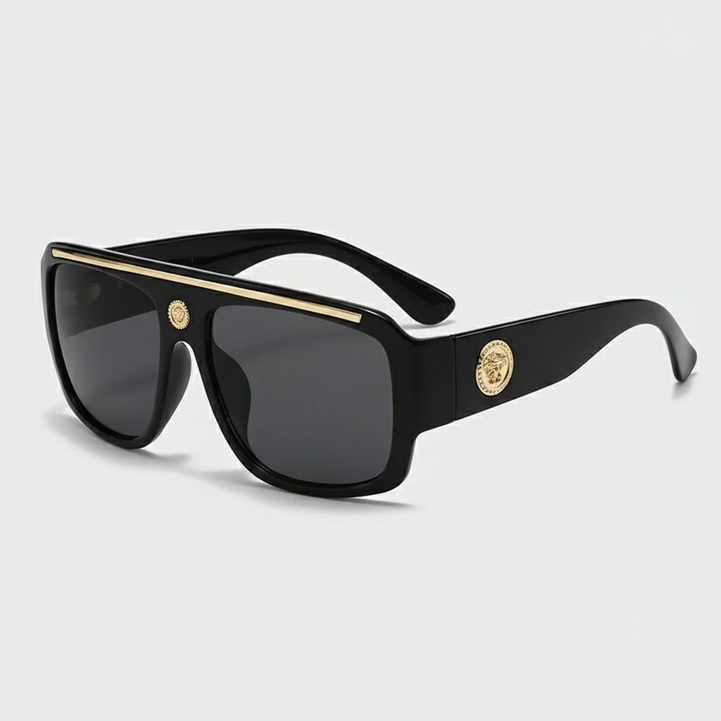 Sunglasses with gold detailing, stylish black frame, ideal for casual adult wear.