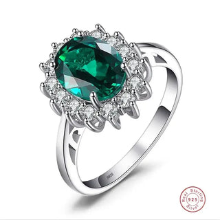 Rings Sterling Silver featuring an oval green crystal surrounded by sparkling accents, perfect for women.