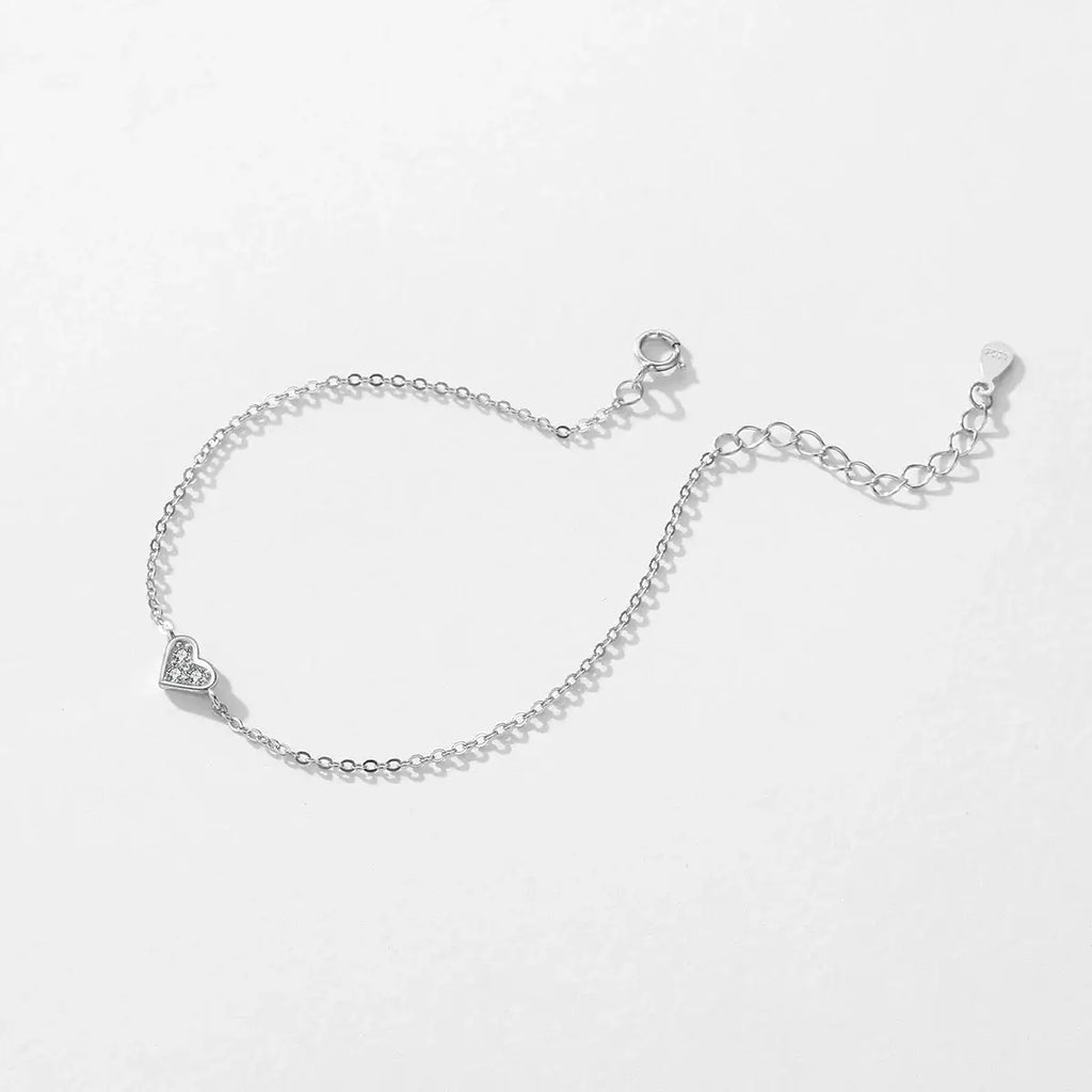 Bracelet 925 sterling silver with heart-shaped zircon accent, adjustable length, lightweight, and waterproof.