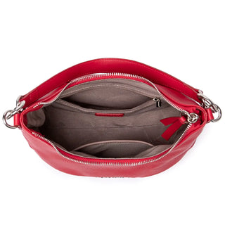 Red luxury crossbody bag interior view showing multiple compartments, designed for women, perfect for casual occasions.
