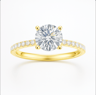 Moissanite Ring 925 Sterling Silver featuring a round-cut center stone and sparkling zircon accents in yellow gold.