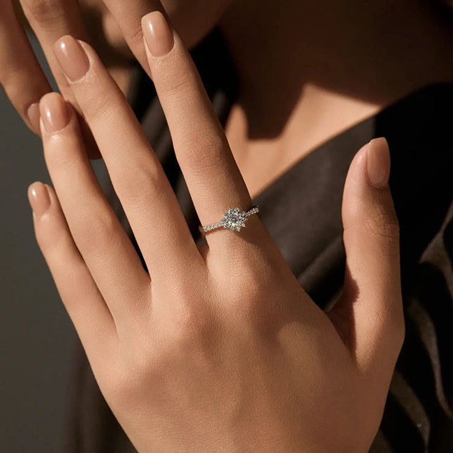 Moissanite Halo Ring in 925 Sterling Silver worn on a hand, showcasing its geometric elegance and brilliance.