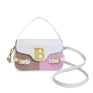 Womens crossbody bag with color-blocking in pink and beige, featuring decorative gold hardware and a shoulder strap.