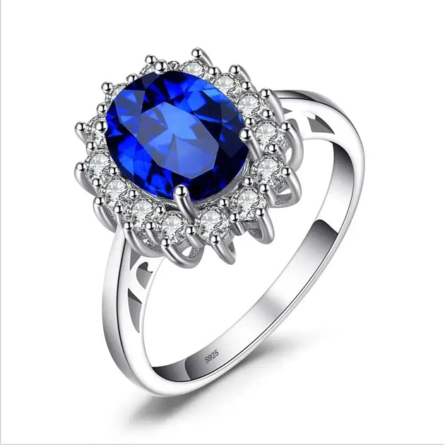 Rings Sterling Silver with Oval Blue Sapphire Crystal surrounded by diamonds, perfect for women.