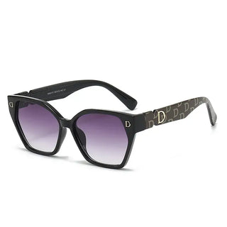 Women's sunglasses with black frames featuring stylish purple gradient lenses.
