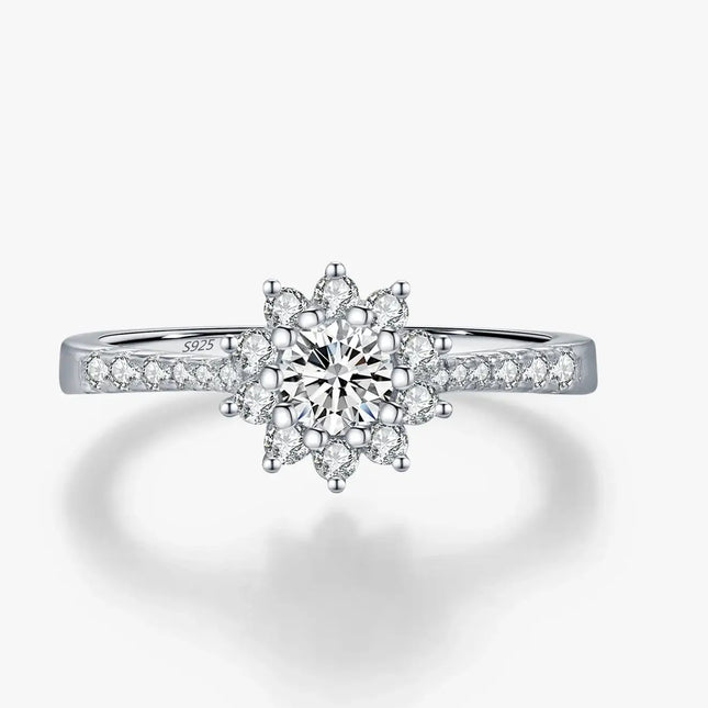 Moissanite Halo Ring in 925 Sterling Silver featuring a round-cut diamond design with multiple stones.