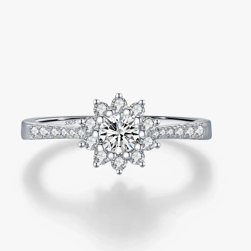 Moissanite Halo Ring in 925 Sterling Silver featuring a round-cut diamond design with multiple stones.