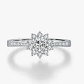 Moissanite Halo Ring in 925 Sterling Silver featuring a round-cut diamond design with multiple stones.