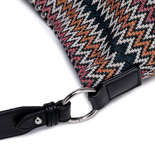 Women's multicolor zigzag shoulder bag strap detail showcasing quality craftsmanship and stylish design.