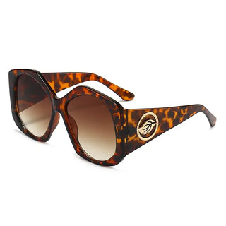 Sunglasses with unique design and logo, perfect for outdoor sports and sand activities, stylish adult eyewear.