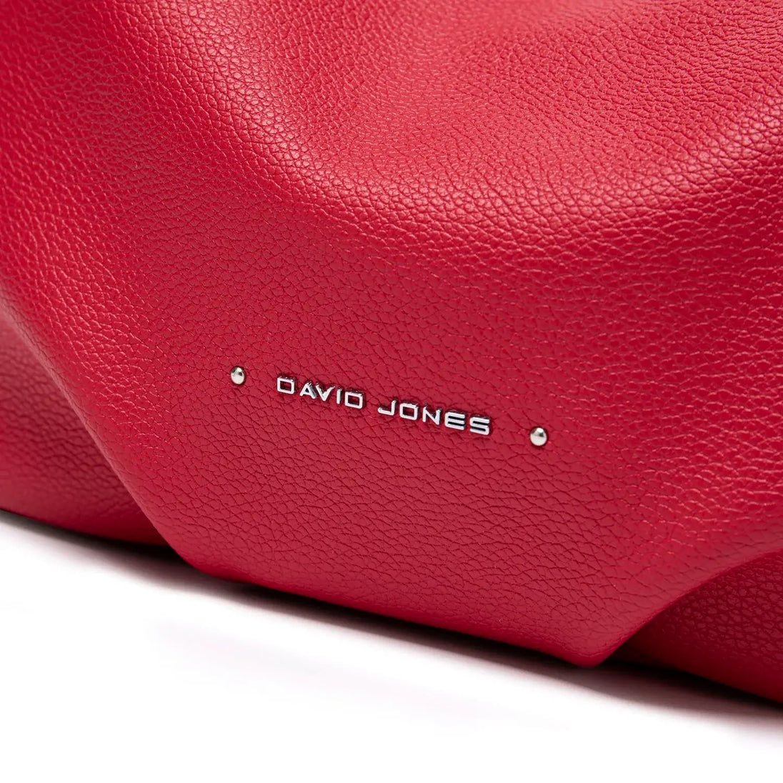 Luxury red shoulder bag from David Jones, soft PU material, ideal for casual and party occasions.