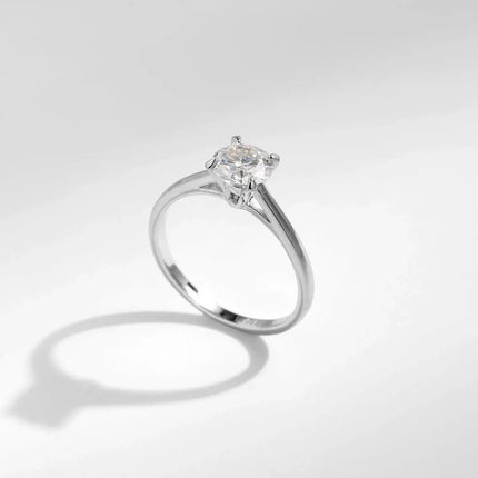 Round Moissanite Ring in 925 Sterling Silver showcasing a D-color VVS1 stone in a prong setting.