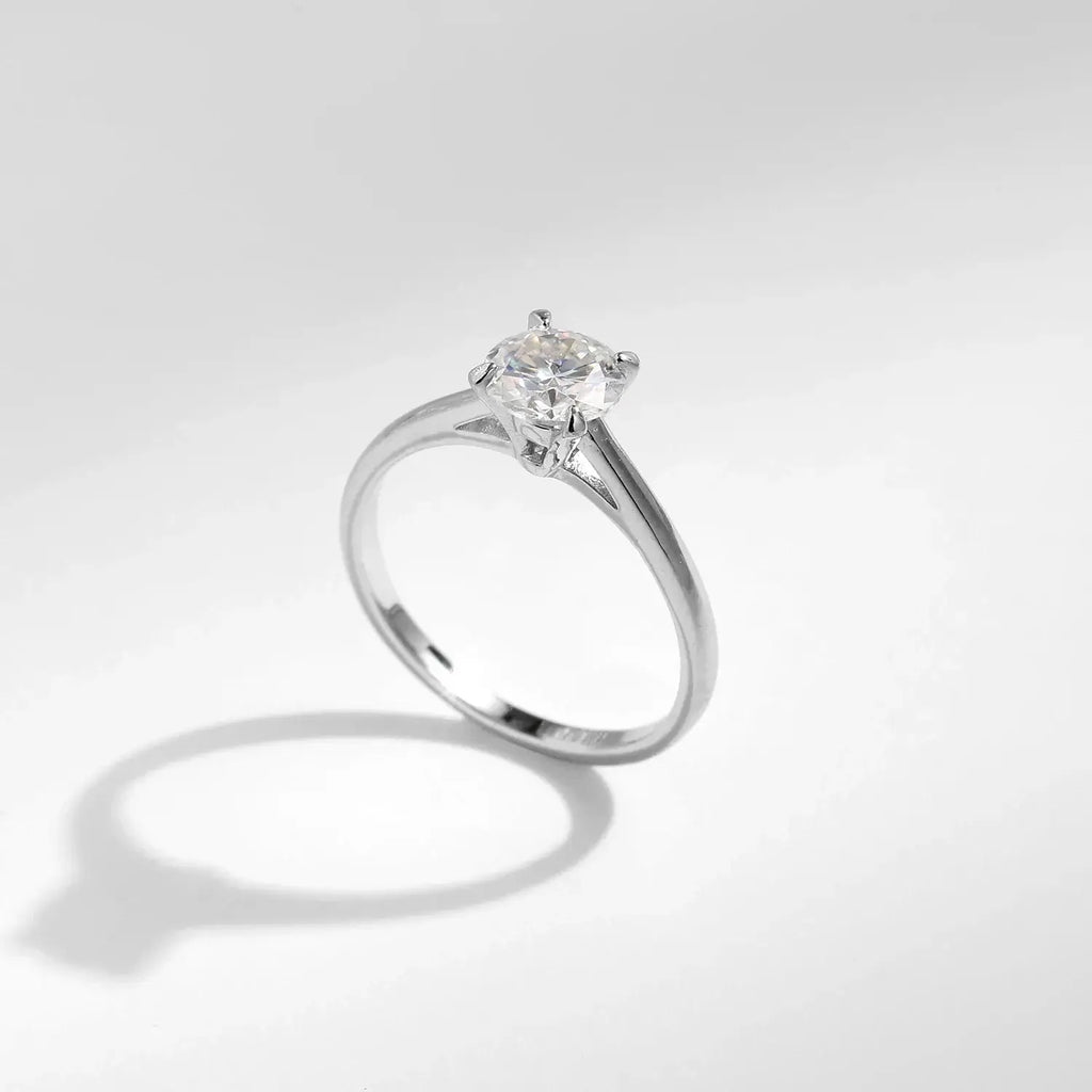 Round Moissanite Ring in 925 Sterling Silver showcasing a D-color VVS1 stone in a prong setting.