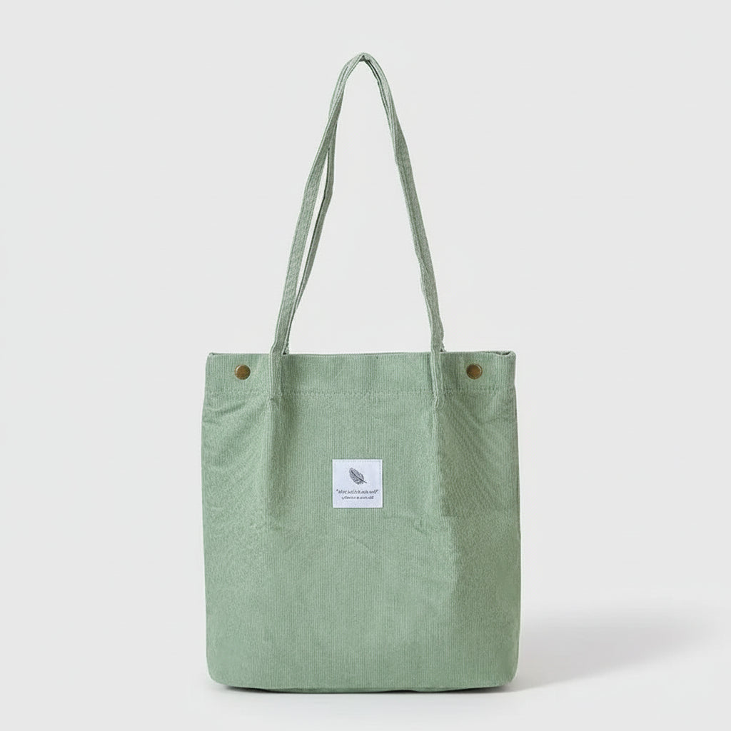 Light green Shopping Tote Bags with long handles made of corduroy and canvas.