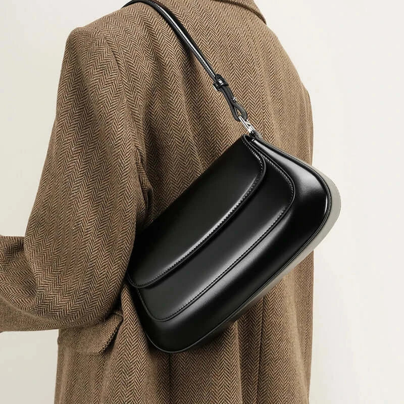 Shoulder bag leather - solid black, premium cowhide, structured saddle bag for casual and elegant looks.