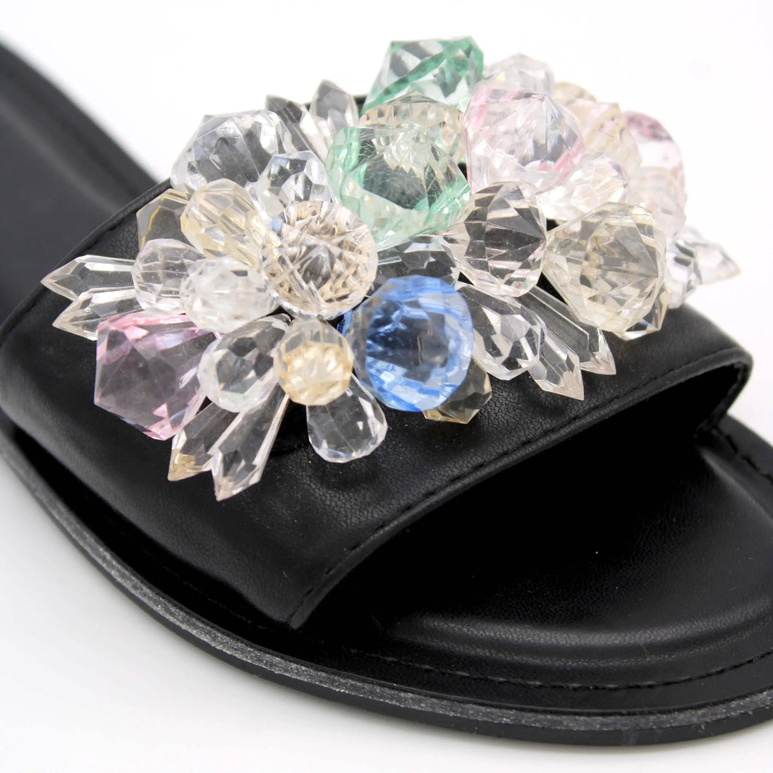 Black Soraia slippers featuring a colorful gem flower design, perfect women's sandals for casual outings.
