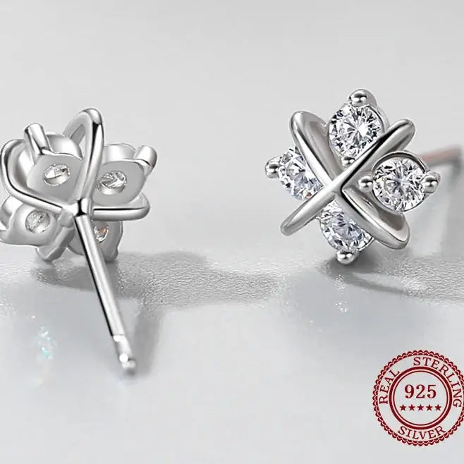 Snowflake Zircon Stud Earrings 925 Sterling Silver featuring sparkling zircon stones in a chic design.